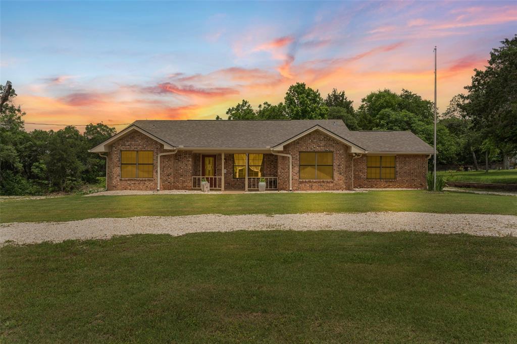 162 High Ridge Drive Bruceville, TX 76630 - Photo 4 of 40 a view of house that has a yard