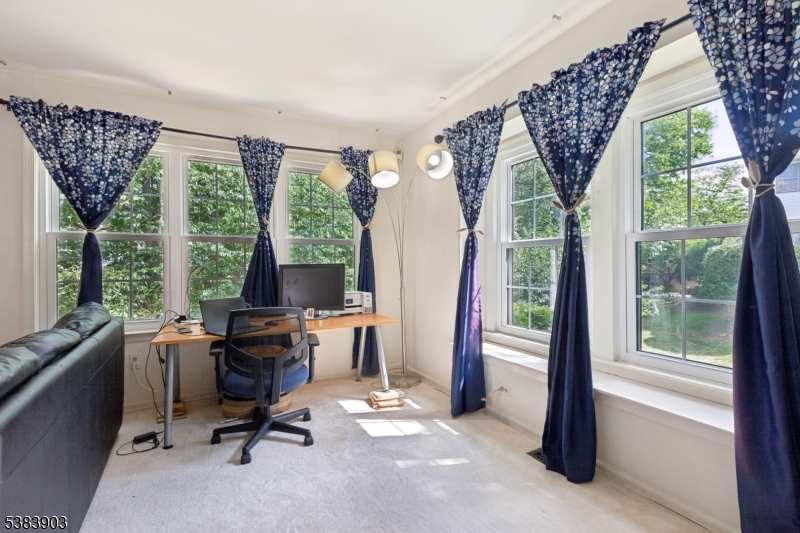 3606 Springbrook Drive Edison, NJ 08820 - Photo 6 of 25 a view of workspace with a large window and tv