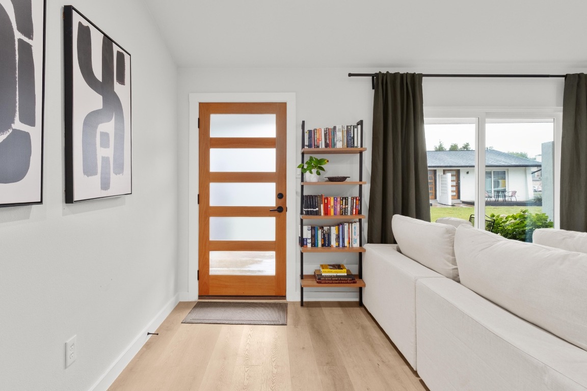 1213 Hollow Creek Drive, Unit 3 Austin, TX 78704 - Photo 5 of 15 a living room with furniture and a window