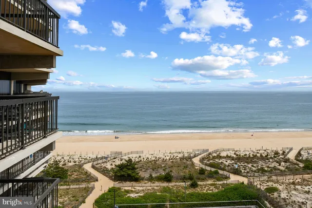 a view of a balcony with an ocean view