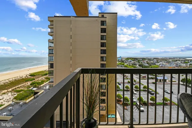 a view of a balcony with an ocean view