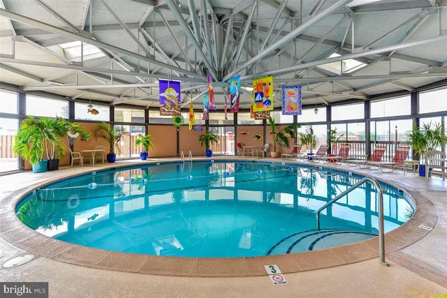 a view of a swimming pool with a patio