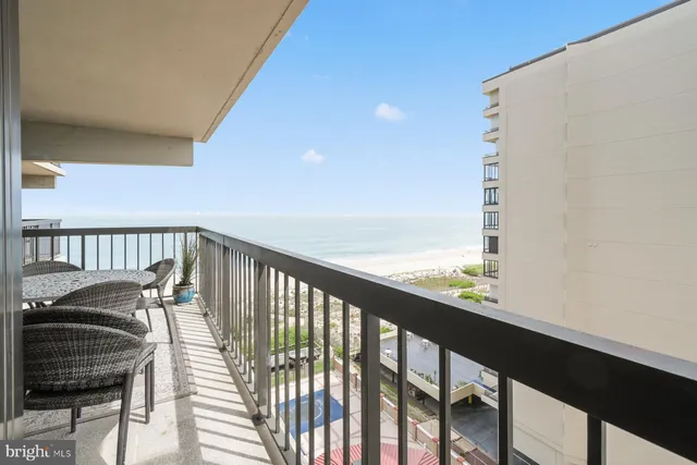 a view of balcony with furniture