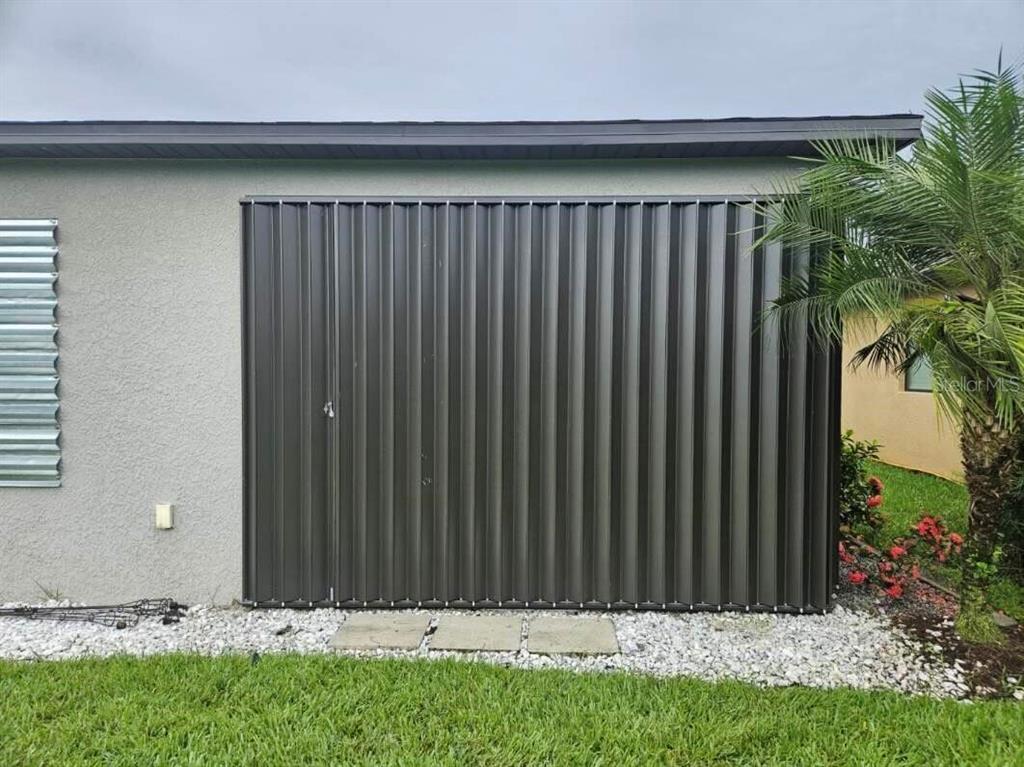 2137 Apian Way Port Charlotte, FL 33953 - Photo 6 of 25 a view of wooden door