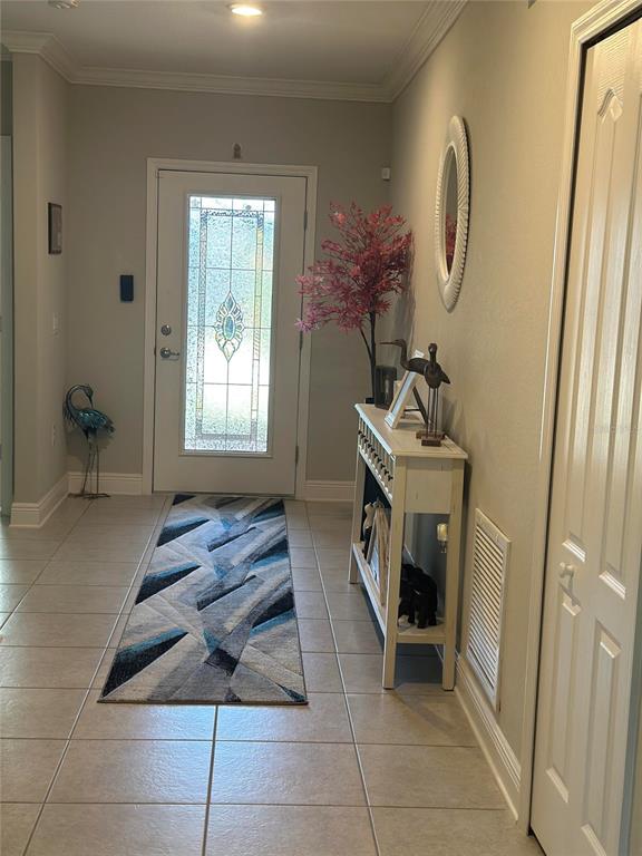 2137 Apian Way Port Charlotte, FL 33953 - Photo 8 of 25 a room with furniture and a window