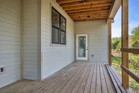a view of outdoor space and wooden deck