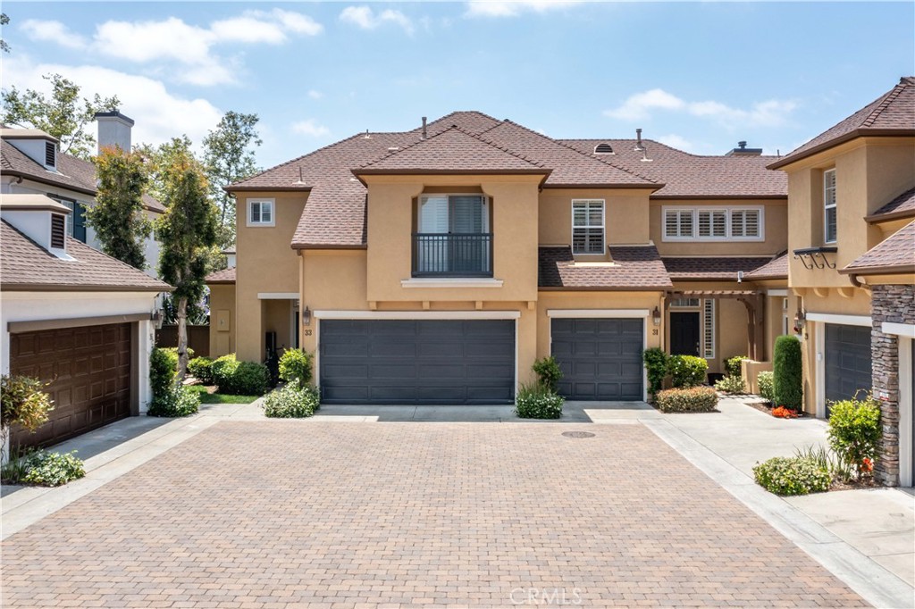 31 Amesbury Court Ladera Ranch, CA 92694 - Photo 1 of 1 a front view of a house with yard and parking