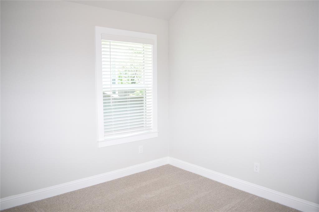 2605 Sam Bass Road, Unit 25 Round Rock, TX 78681 - Photo 13 of 25 an empty room with a window