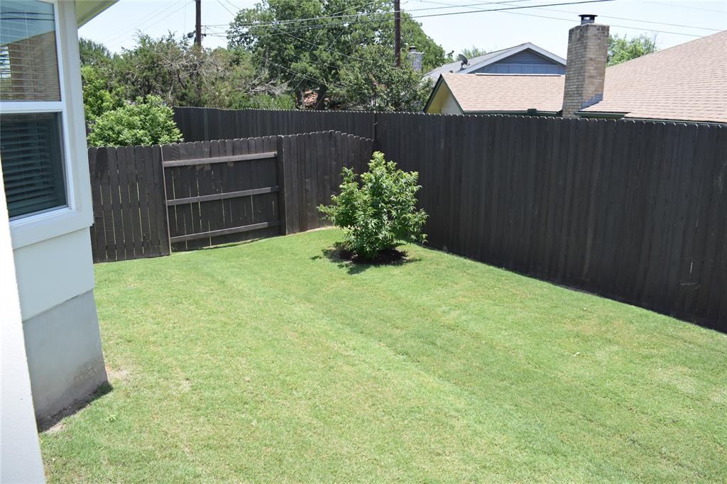2605 Sam Bass Road, Unit 25 Round Rock, TX 78681 - Photo 18 of 25 a view of balcony with wooden fence