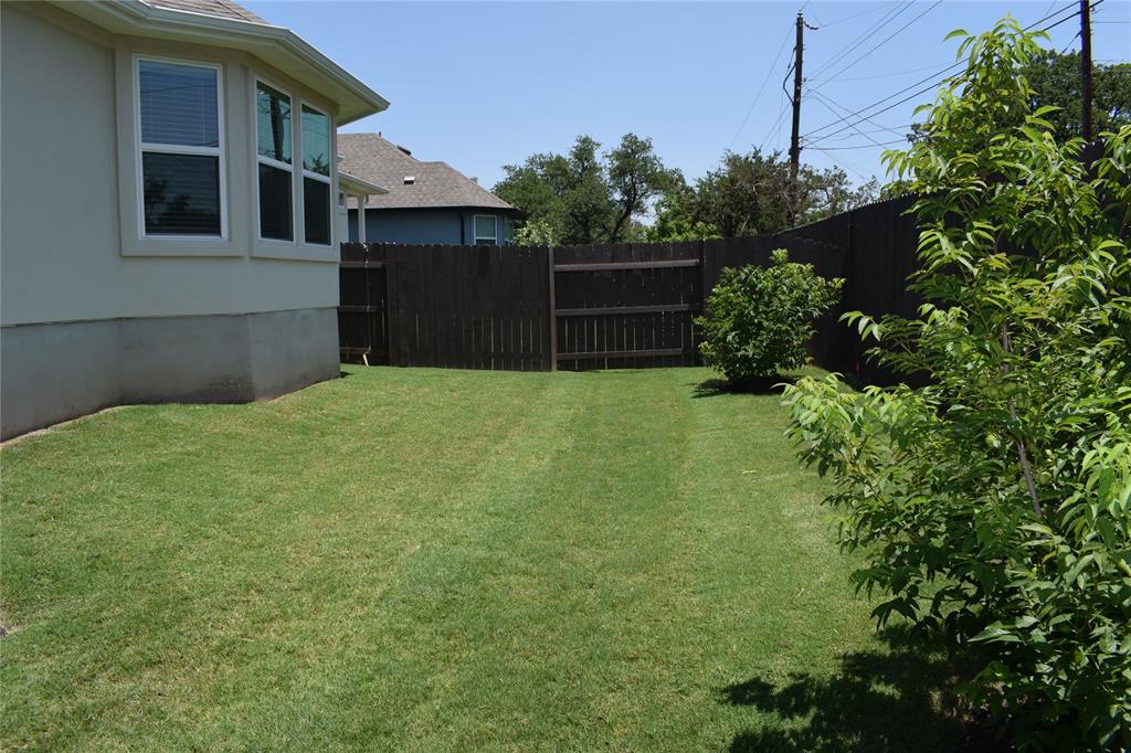 2605 Sam Bass Road, Unit 25 Round Rock, TX 78681 - Photo 21 of 25 a view of a backyard