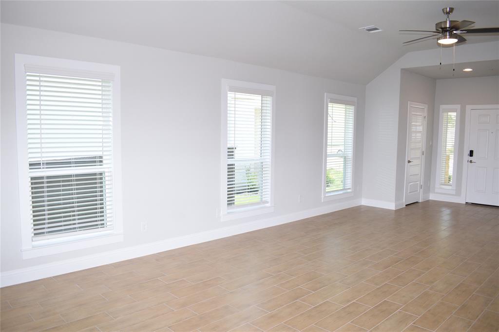 2605 Sam Bass Road, Unit 25 Round Rock, TX 78681 - Photo 6 of 25 a view of an empty room with a window