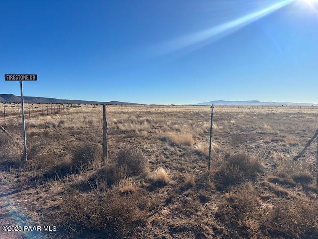A A Firestone Drive Paulden, AZ 86334 - Photo 3 of 7 a view of a dry yard with wooden fence