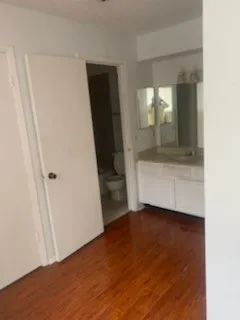 an empty room with mirror