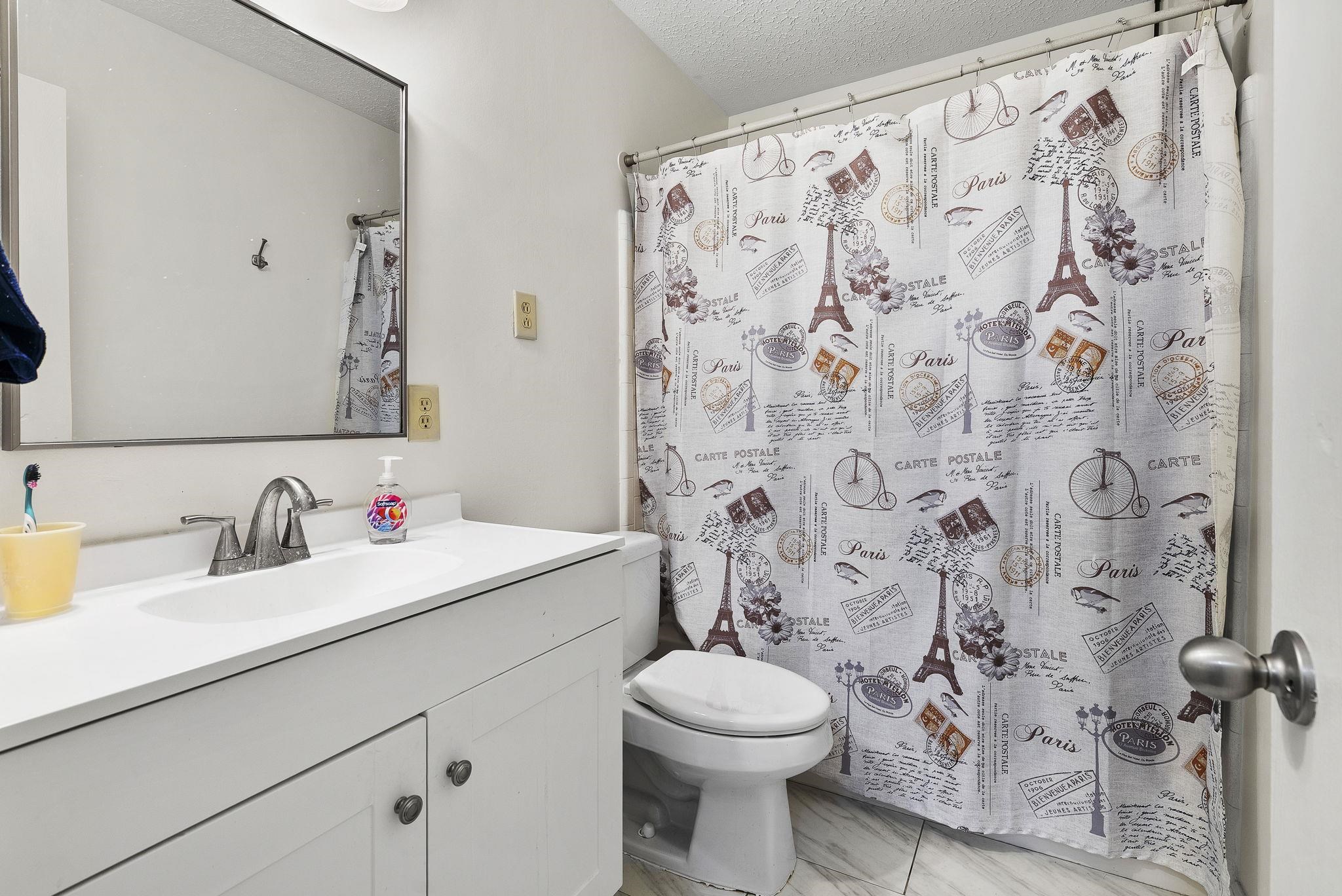 6997 Fords Station Road, Unit 16 Germantown, TN 38138 - Photo 21 of 36 a bathroom with a sink and a toilet