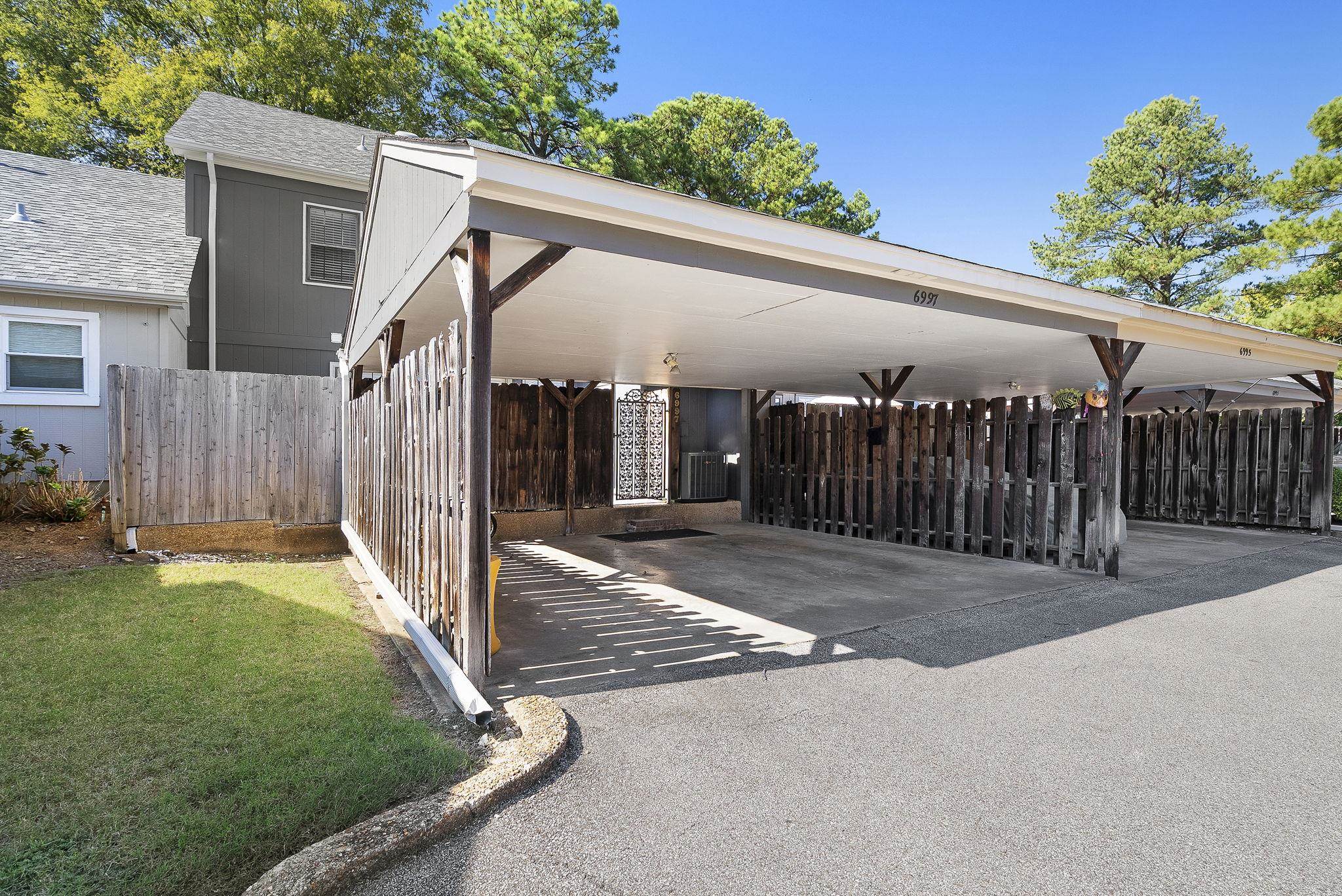 6997 Fords Station Road, Unit 16 Germantown, TN 38138 - Photo 25 of 36 a view of a patio with a table and chairs