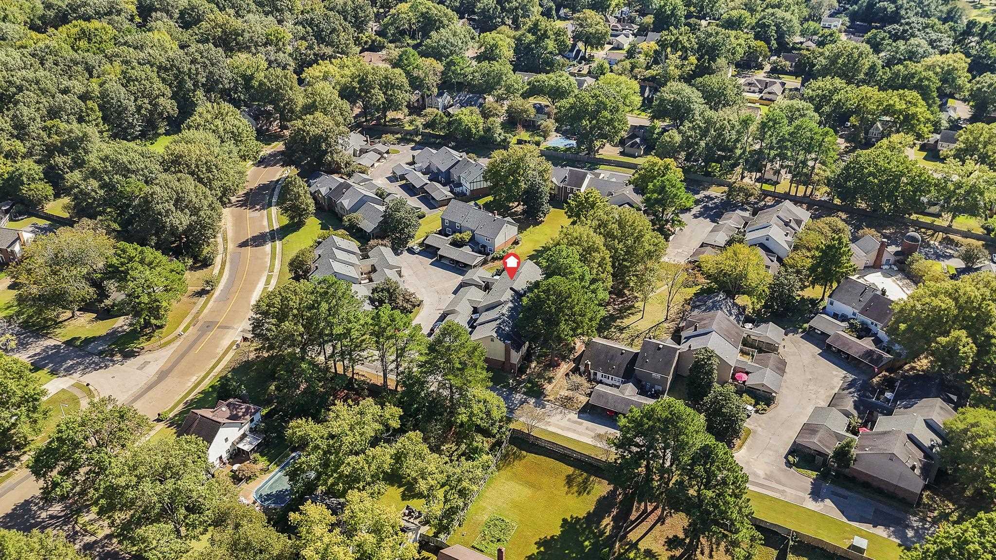 6997 Fords Station Road, Unit 16 Germantown, TN 38138 - Photo 30 of 36 an aerial view of residential houses with outdoor space and trees