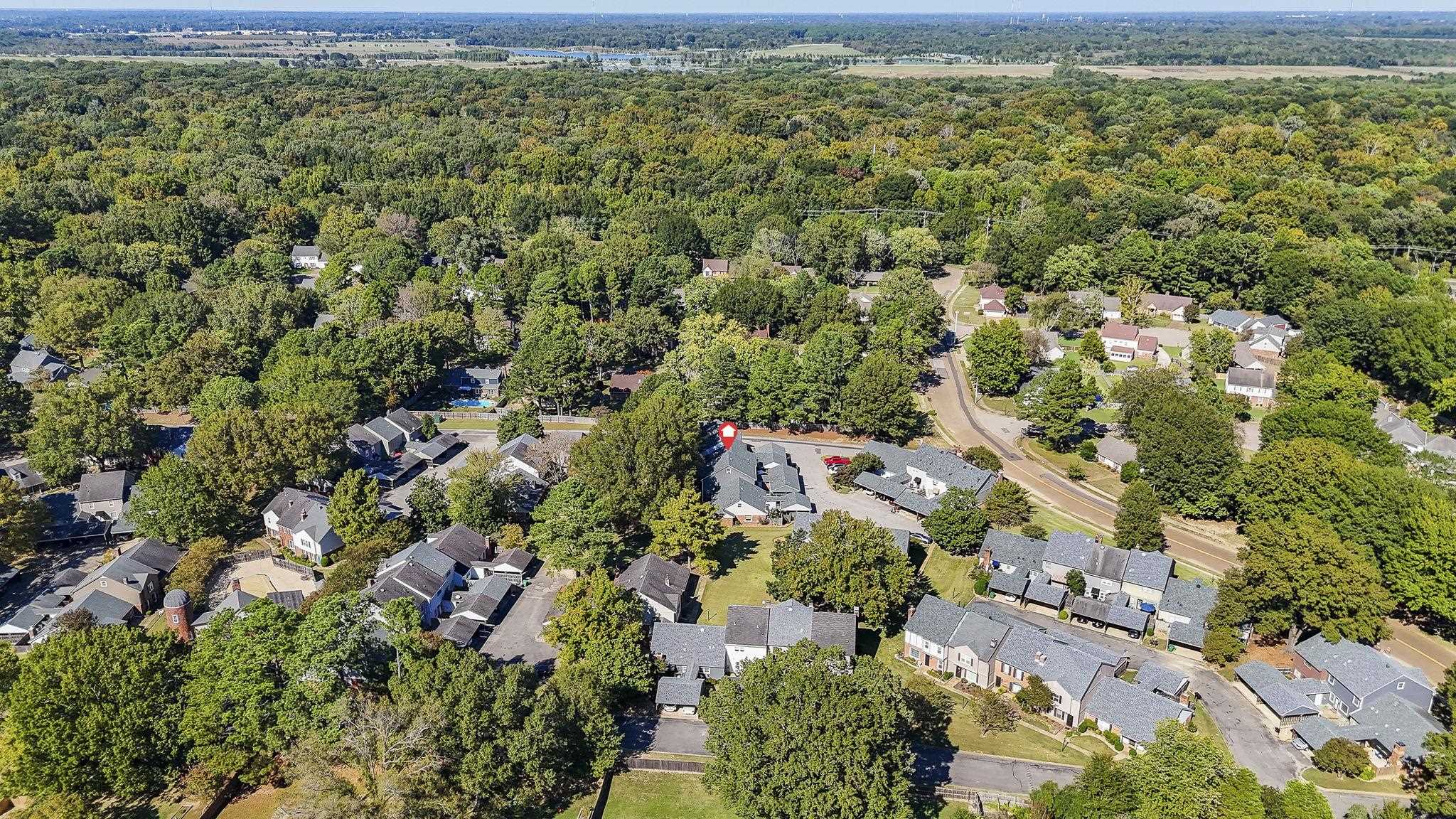 6997 Fords Station Road, Unit 16 Germantown, TN 38138 - Photo 32 of 36 an aerial view of residential houses with outdoor space