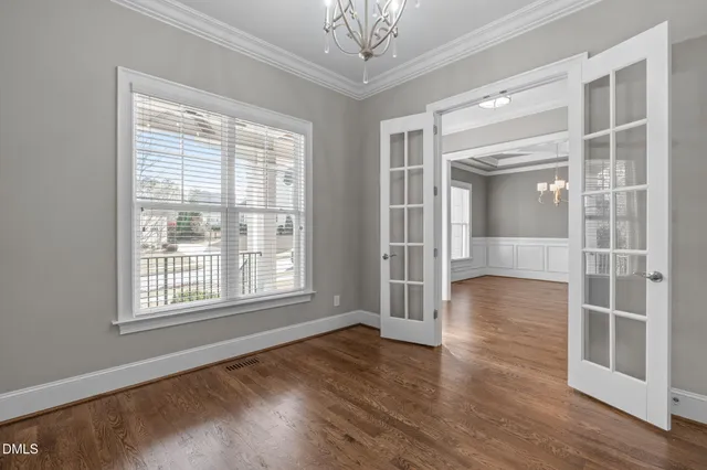 a kitchen with cabinets and stove