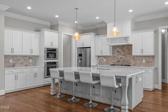 a view of an empty room and closet area