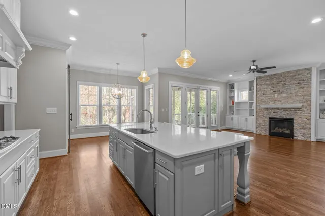 a view of a room with wooden floor and balcony