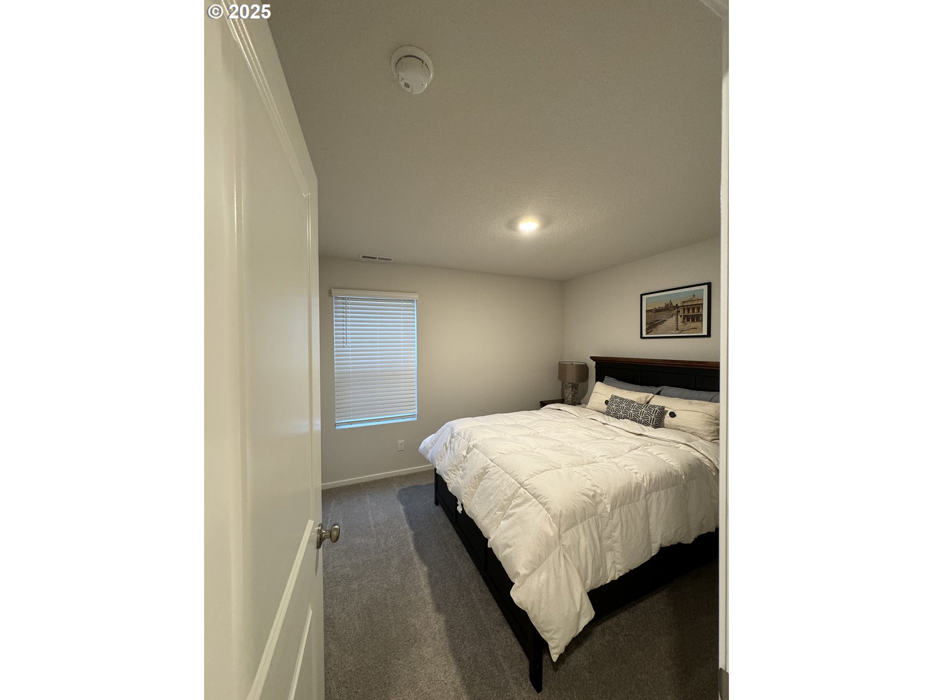 861 North 19th Avenue Cornelius, OR 97113 - Photo 15 of 15 a bedroom with a bed and a cabinets