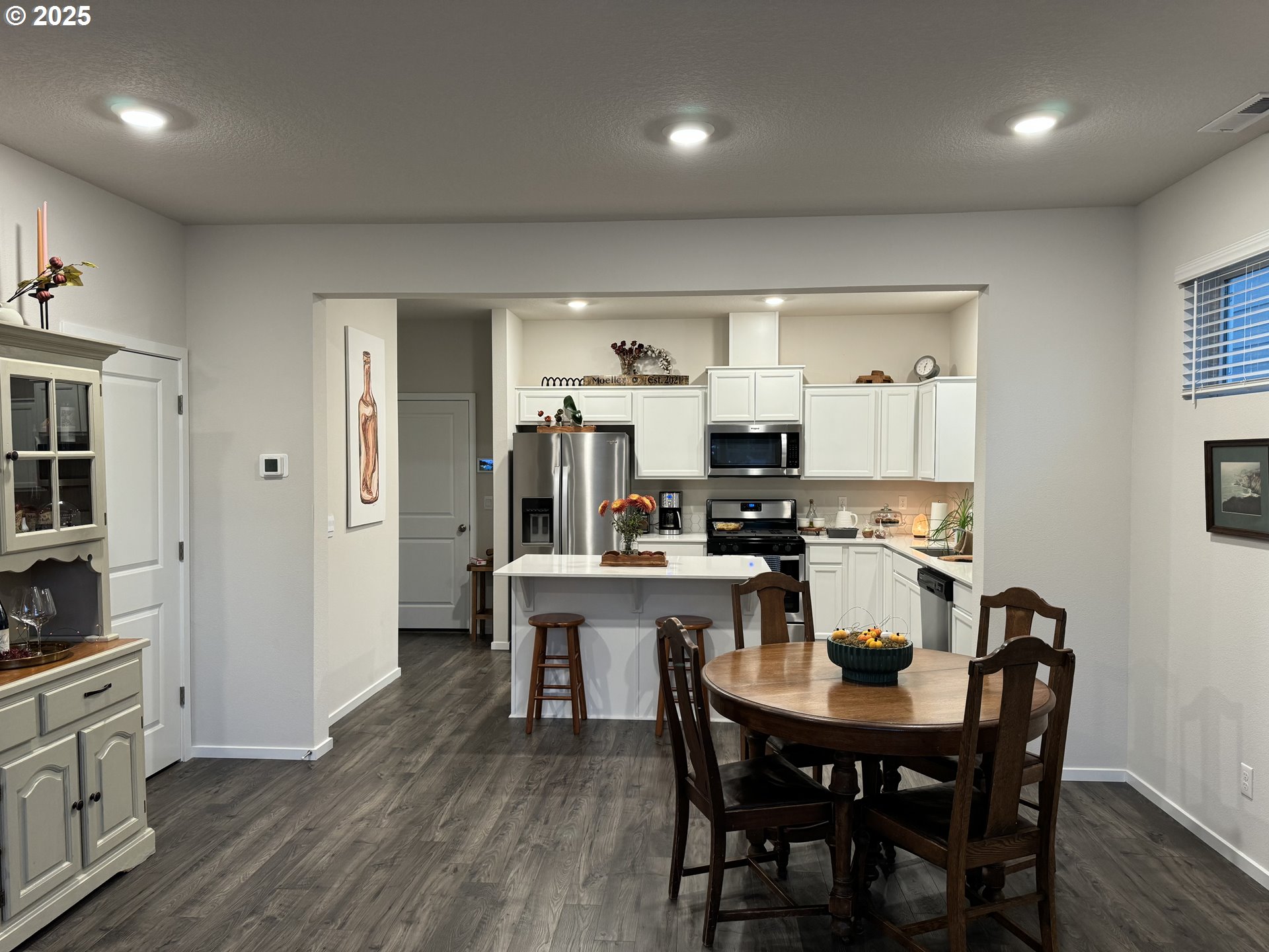 861 North 19th Avenue Cornelius, OR 97113 - Photo 5 of 15 a view of a dining room with furniture and wooden floor