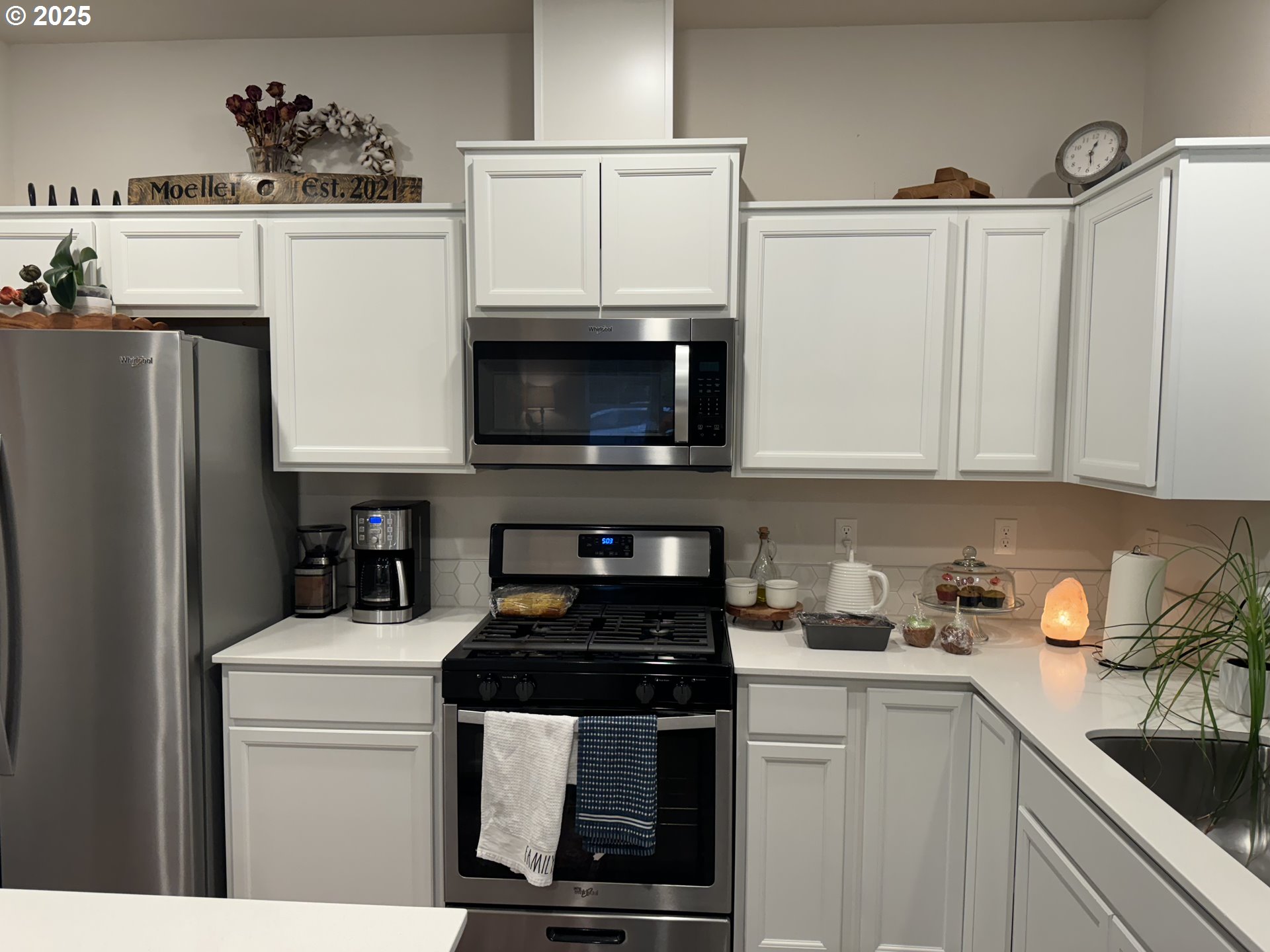 861 North 19th Avenue Cornelius, OR 97113 - Photo 9 of 15 a kitchen with stainless steel appliances a refrigerator a stove a microwave and cabinets