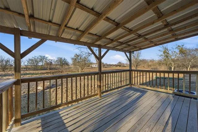 front view of a house with a dry yard
