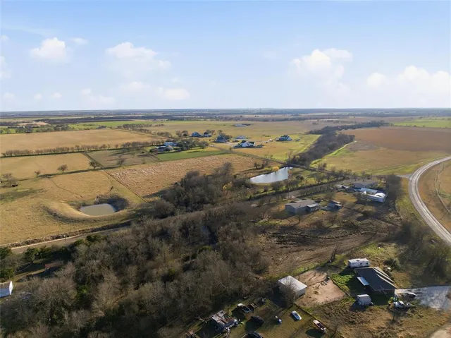 an aerial view of beach and city