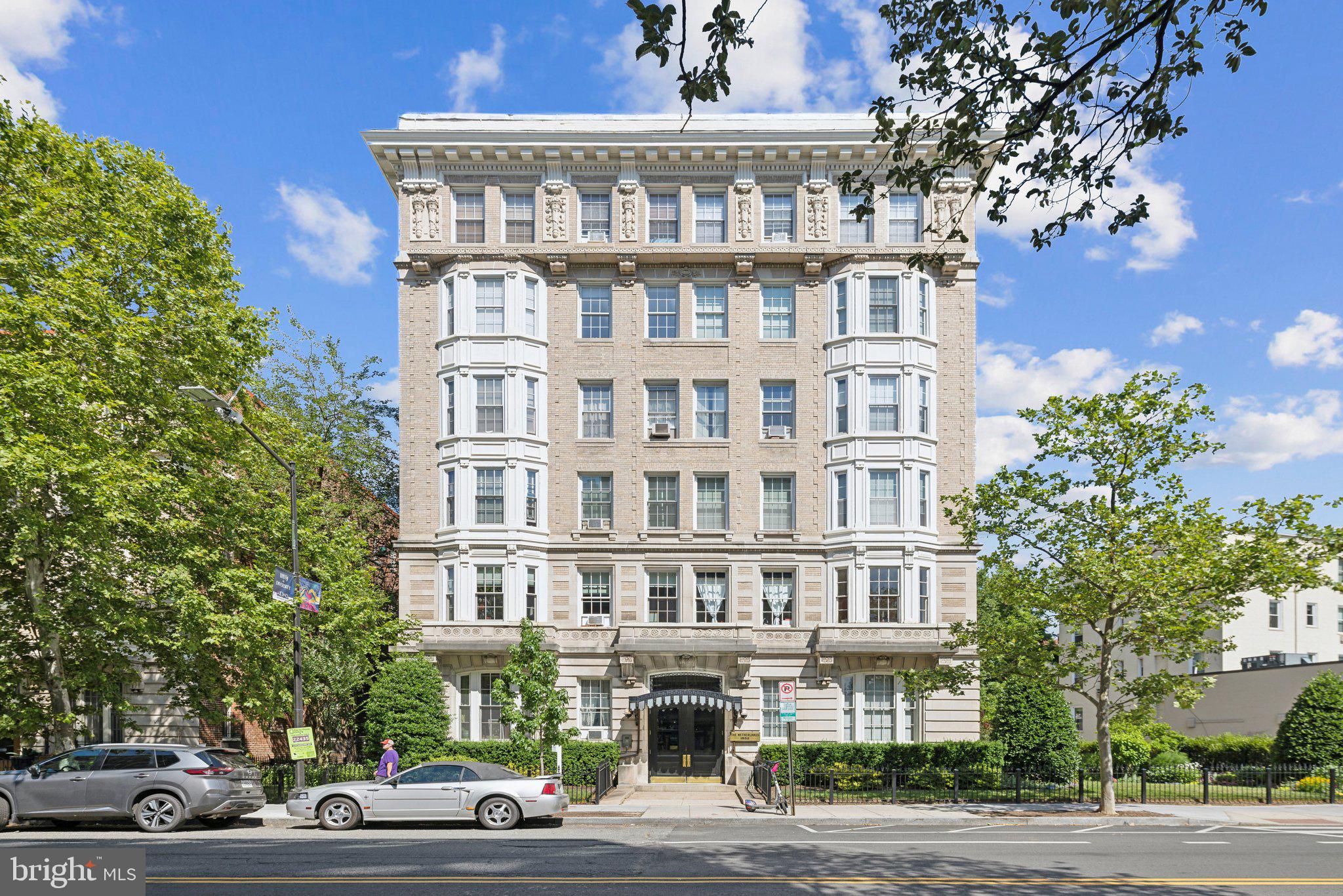 1852 Columbia Road Northwest, Unit 503 Washington, DC 20009 - Photo 2 of 32 a front view of a building with street view