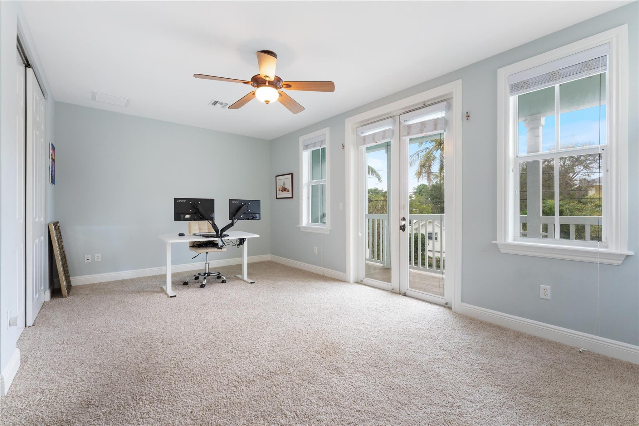 950 Southwest 7th Street, Unit 950 Fort Lauderdale, FL 33315 - Photo 14 of 42 a view of a livingroom with a flat screen tv and a window