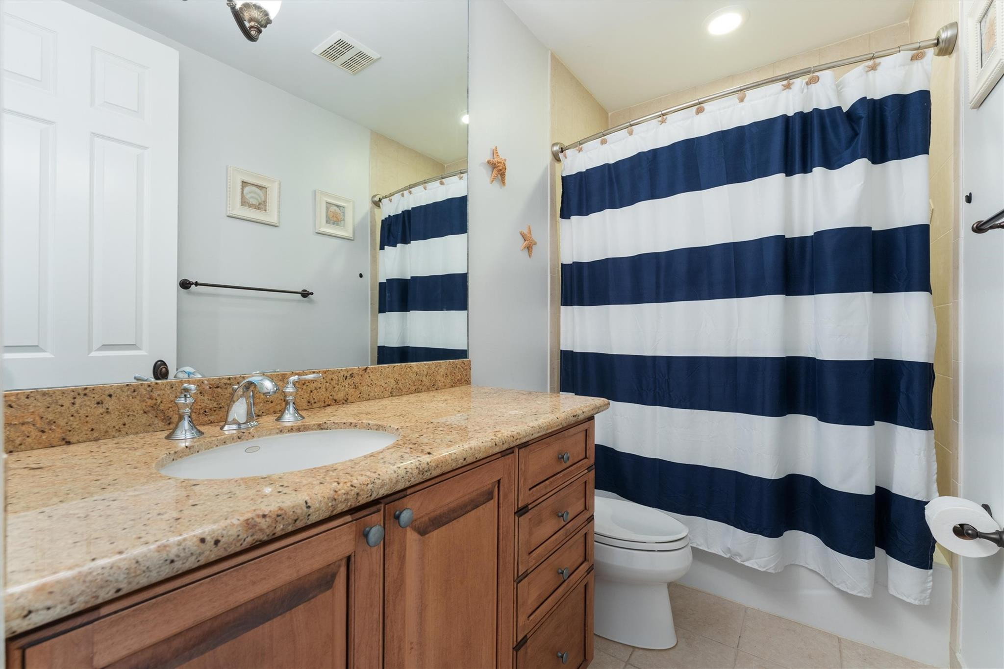 950 Southwest 7th Street, Unit 950 Fort Lauderdale, FL 33315 - Photo 17 of 42 a bathroom with a sink a toilet a shower and a mirror