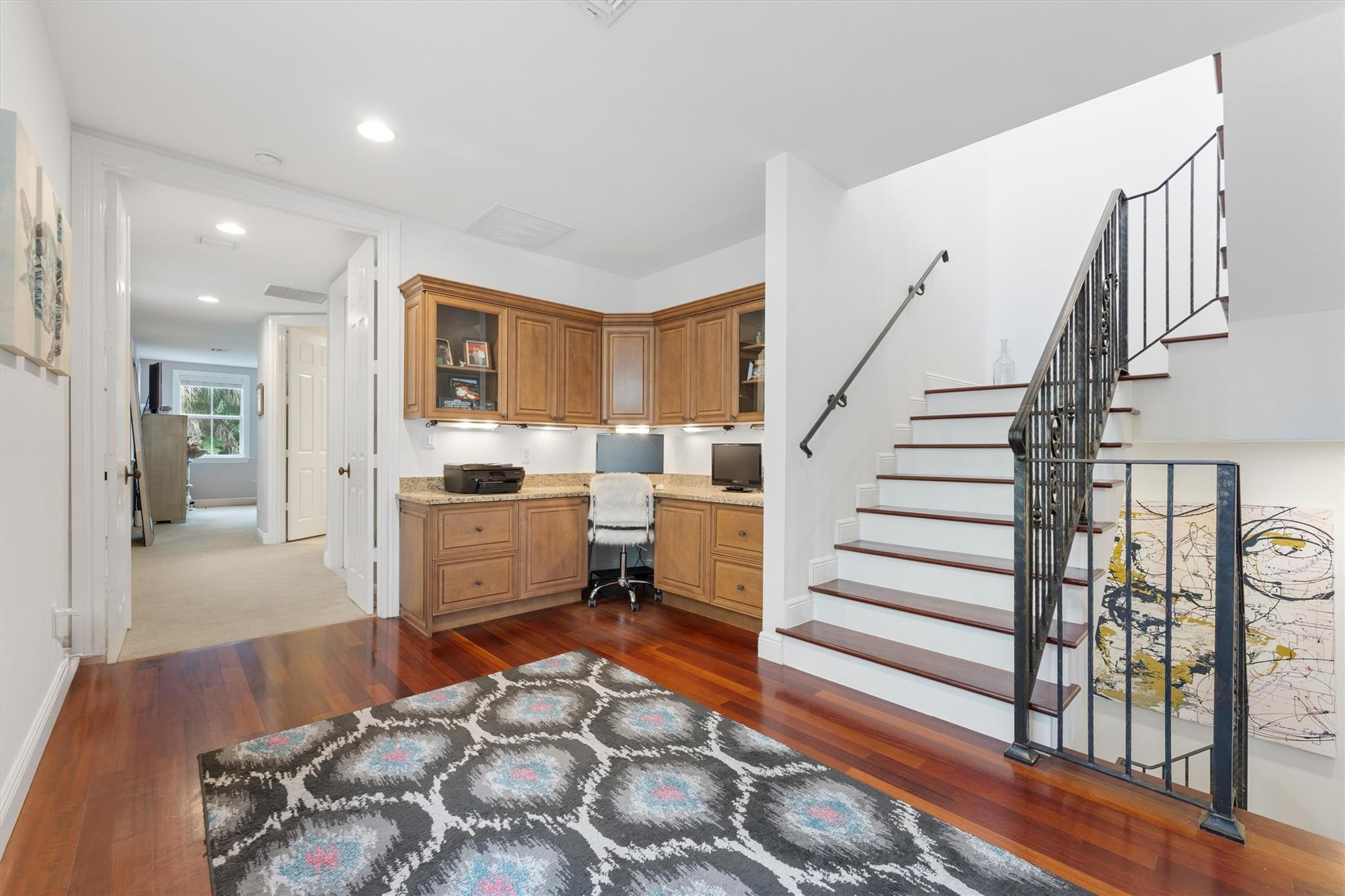 950 Southwest 7th Street, Unit 950 Fort Lauderdale, FL 33315 - Photo 18 of 42 a room with stairs and a wooden floor
