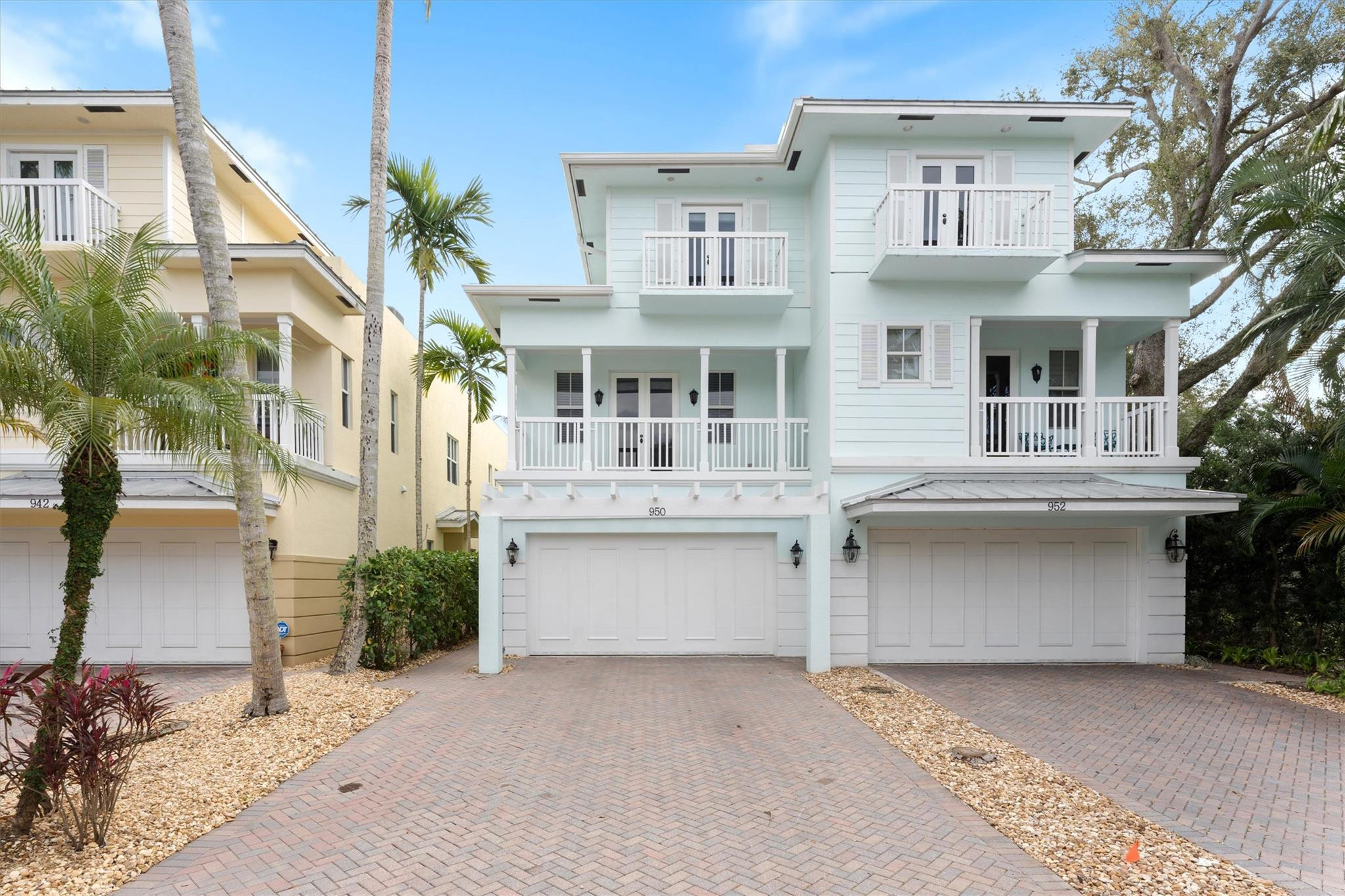 950 Southwest 7th Street, Unit 950 Fort Lauderdale, FL 33315 - Photo 2 of 42 a front view of a building with a yard and balcony