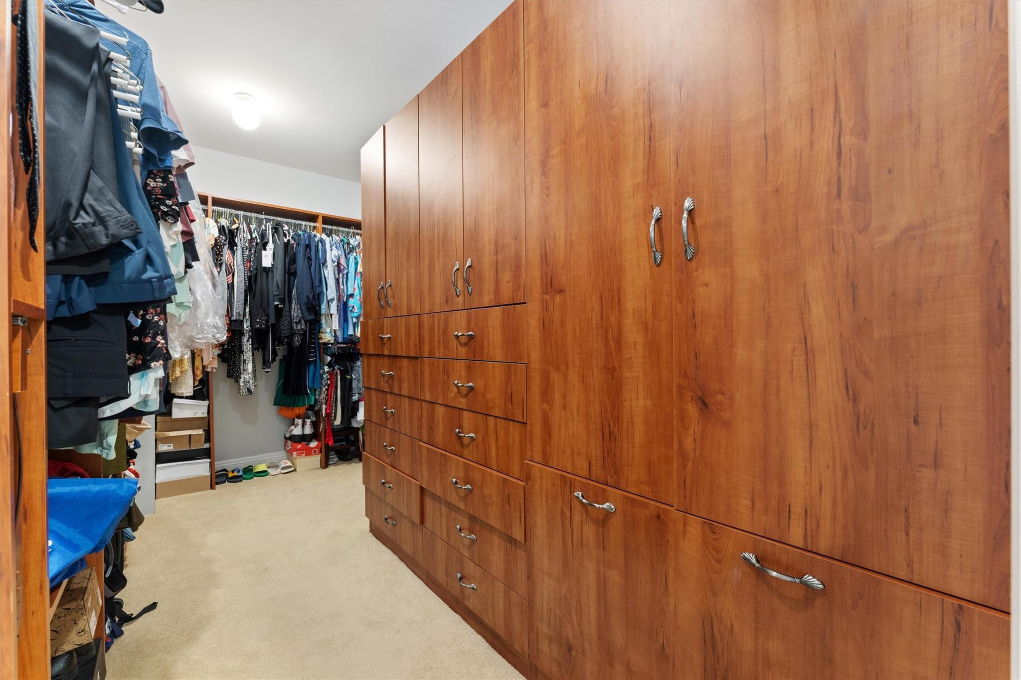 950 Southwest 7th Street, Unit 950 Fort Lauderdale, FL 33315 - Photo 22 of 42 a view of walk in closet with clothes and shoes