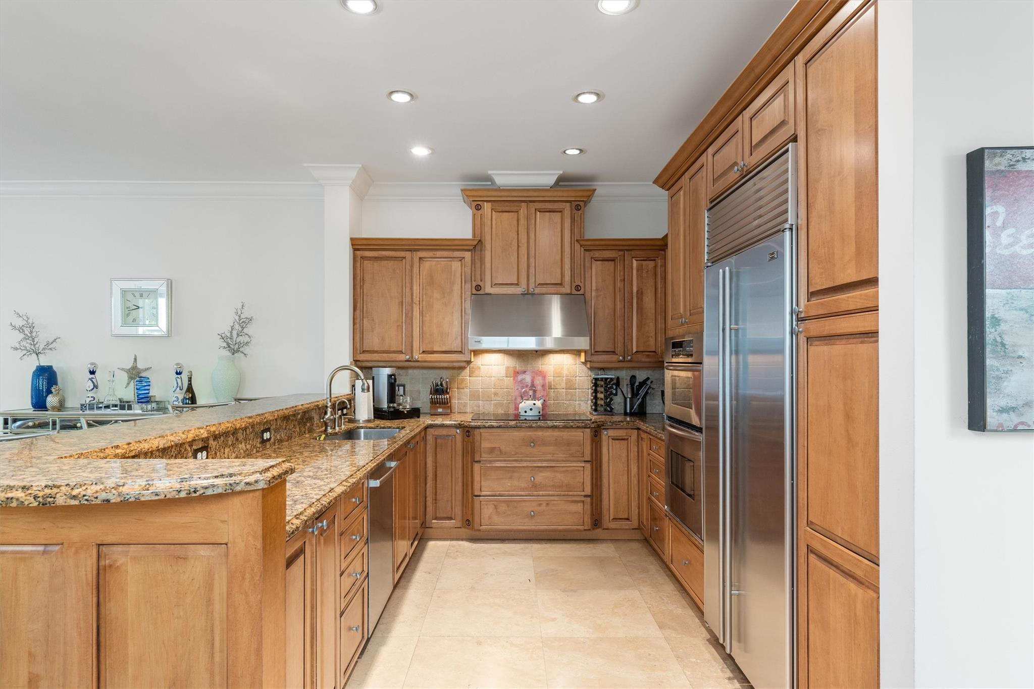 950 Southwest 7th Street, Unit 950 Fort Lauderdale, FL 33315 - Photo 6 of 42 a kitchen with stainless steel appliances granite countertop a sink stove and refrigerator