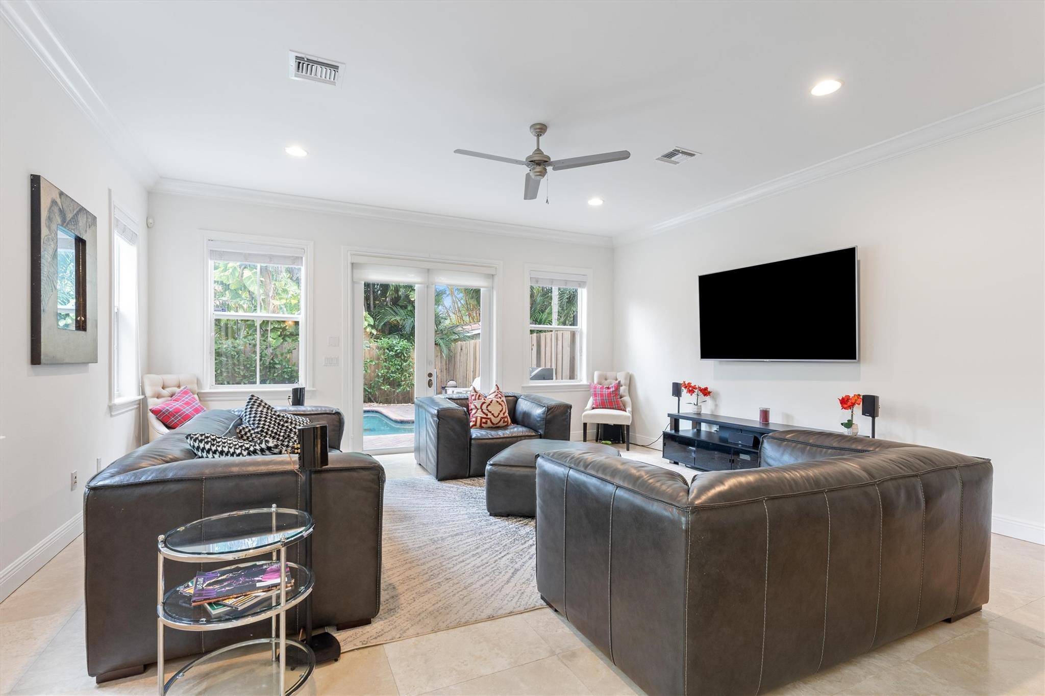 950 Southwest 7th Street, Unit 950 Fort Lauderdale, FL 33315 - Photo 10 of 42 a living room with furniture and a flat screen tv