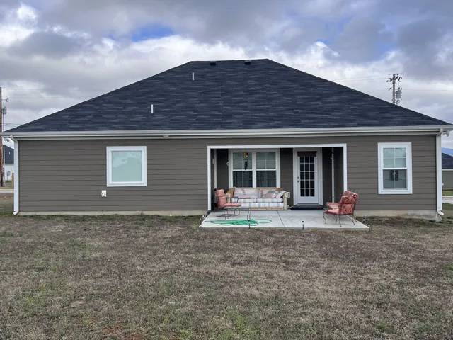 a house view with a outdoor space