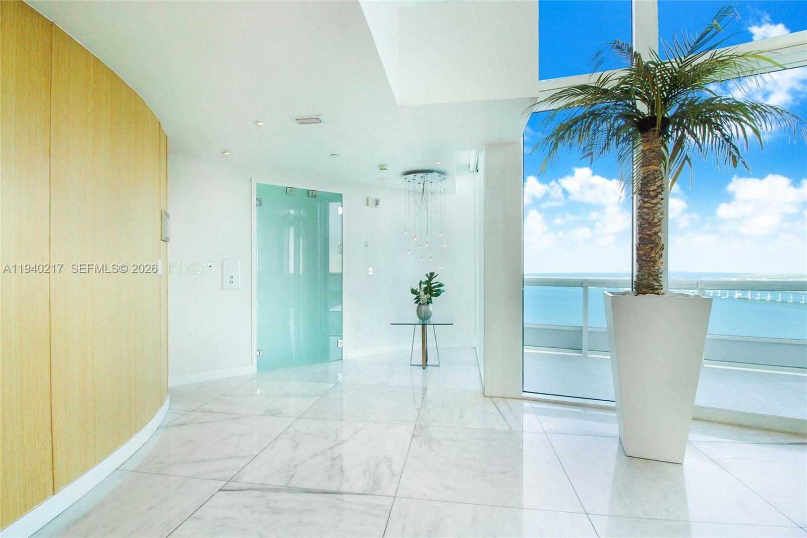 1643 Brickell Avenue, Unit 2902 Miami, FL 33129 - Photo 3 of 32 a view of a bathroom with a shower and a sink