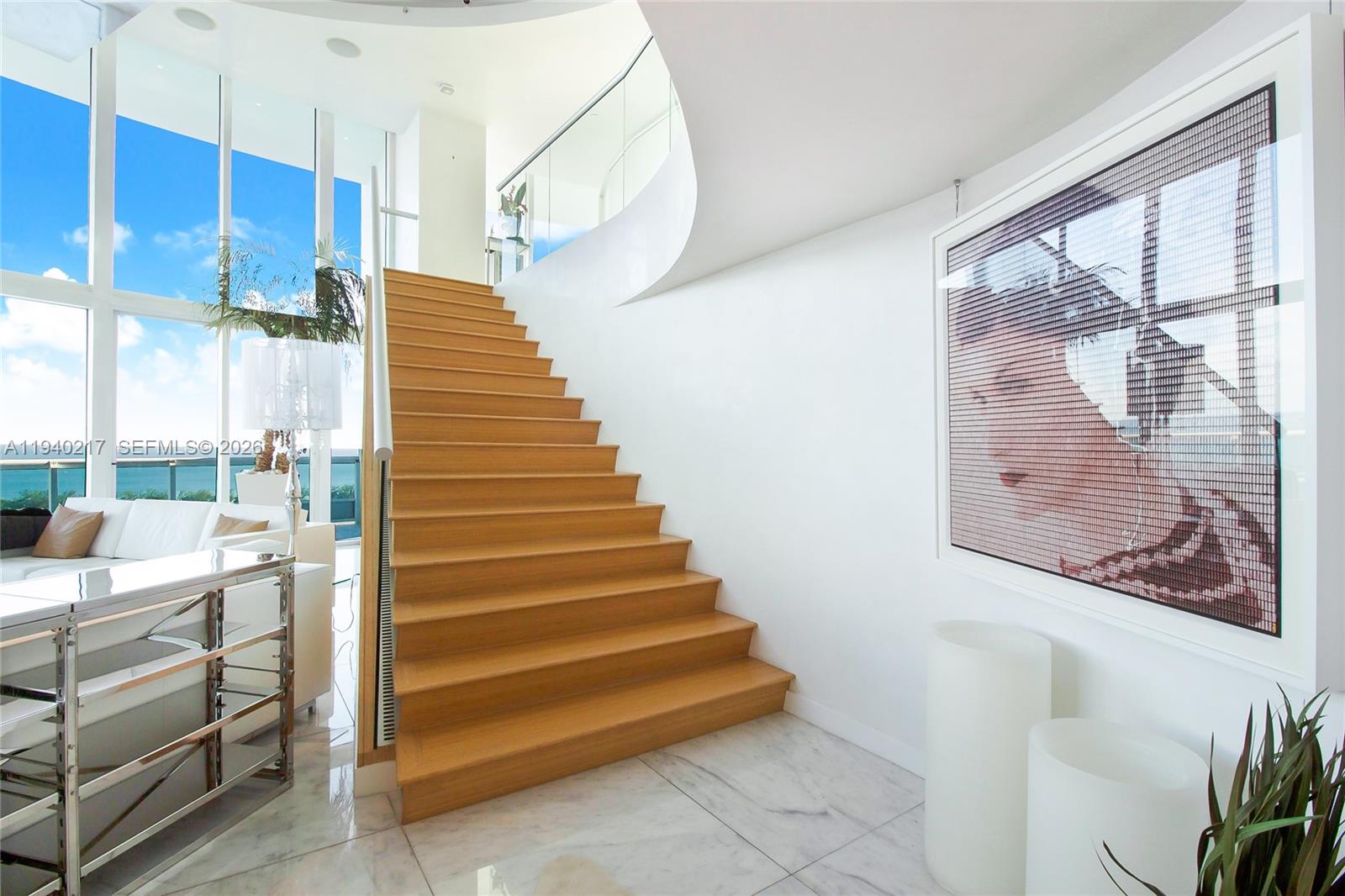 1643 Brickell Avenue, Unit 2902 Miami, FL 33129 - Photo 5 of 32 a view of entryway and hall with wooden floor