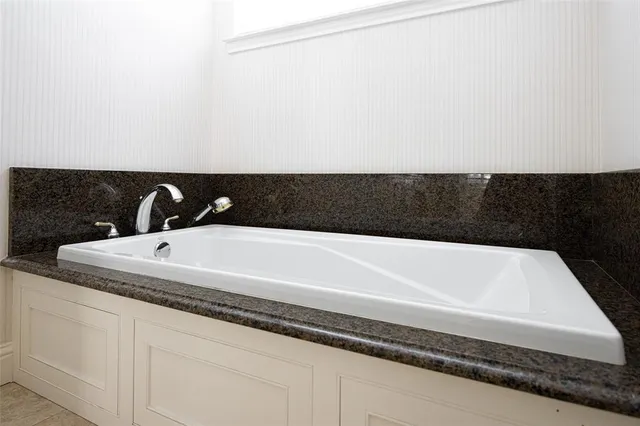 a bathroom with a bathtub