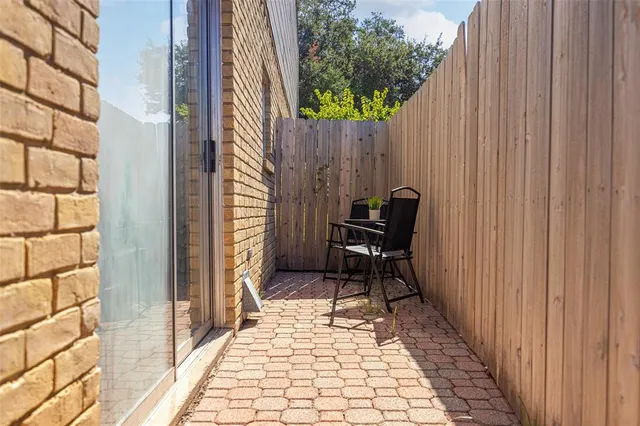 a bench in front of a door