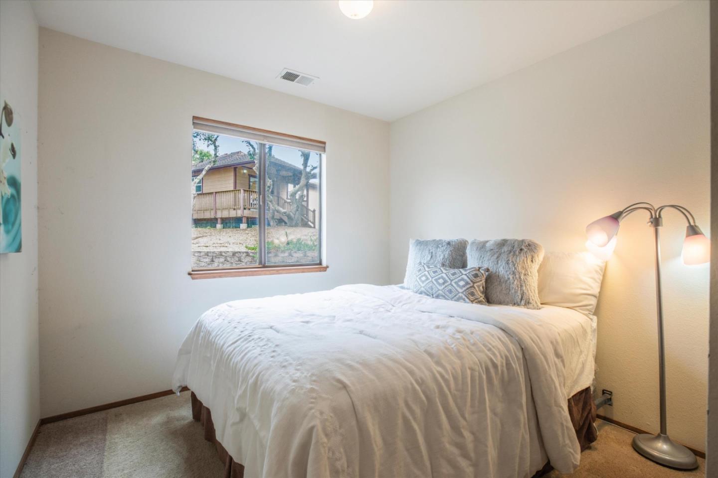 6333 Tustin Road Salinas, CA 93907 - Photo 28 of 88 a bedroom with a bed and a window