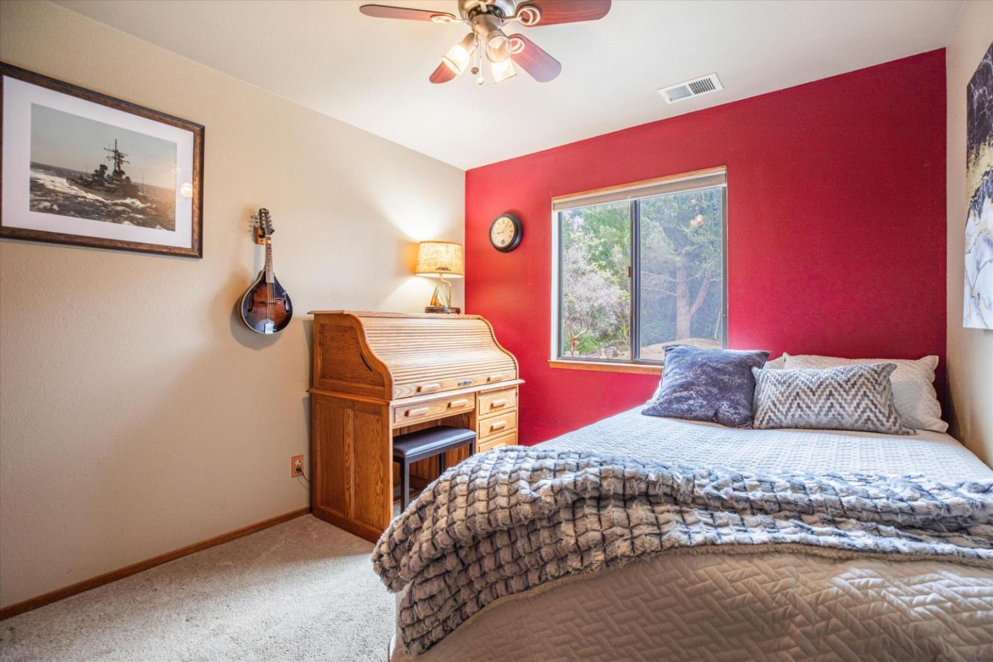 6333 Tustin Road Salinas, CA 93907 - Photo 30 of 88 a bedroom with a large bed and a chandelier