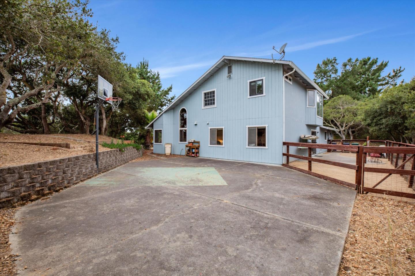6333 Tustin Road Salinas, CA 93907 - Photo 45 of 88 a view of a house with backyard and trees