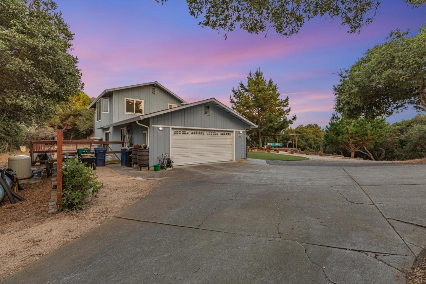 6333 Tustin Road Salinas, CA 93907 - Photo 62 of 88 a front view of a house with a yard and garage