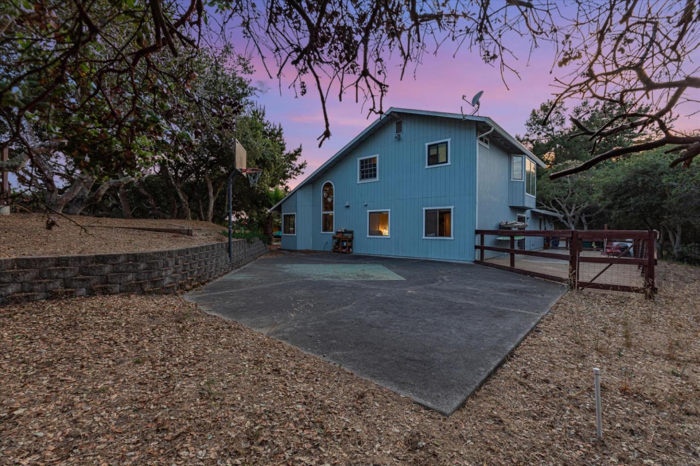 6333 Tustin Road Salinas, CA 93907 - Photo 66 of 88 a view of backyard with wooden fence and a large tree
