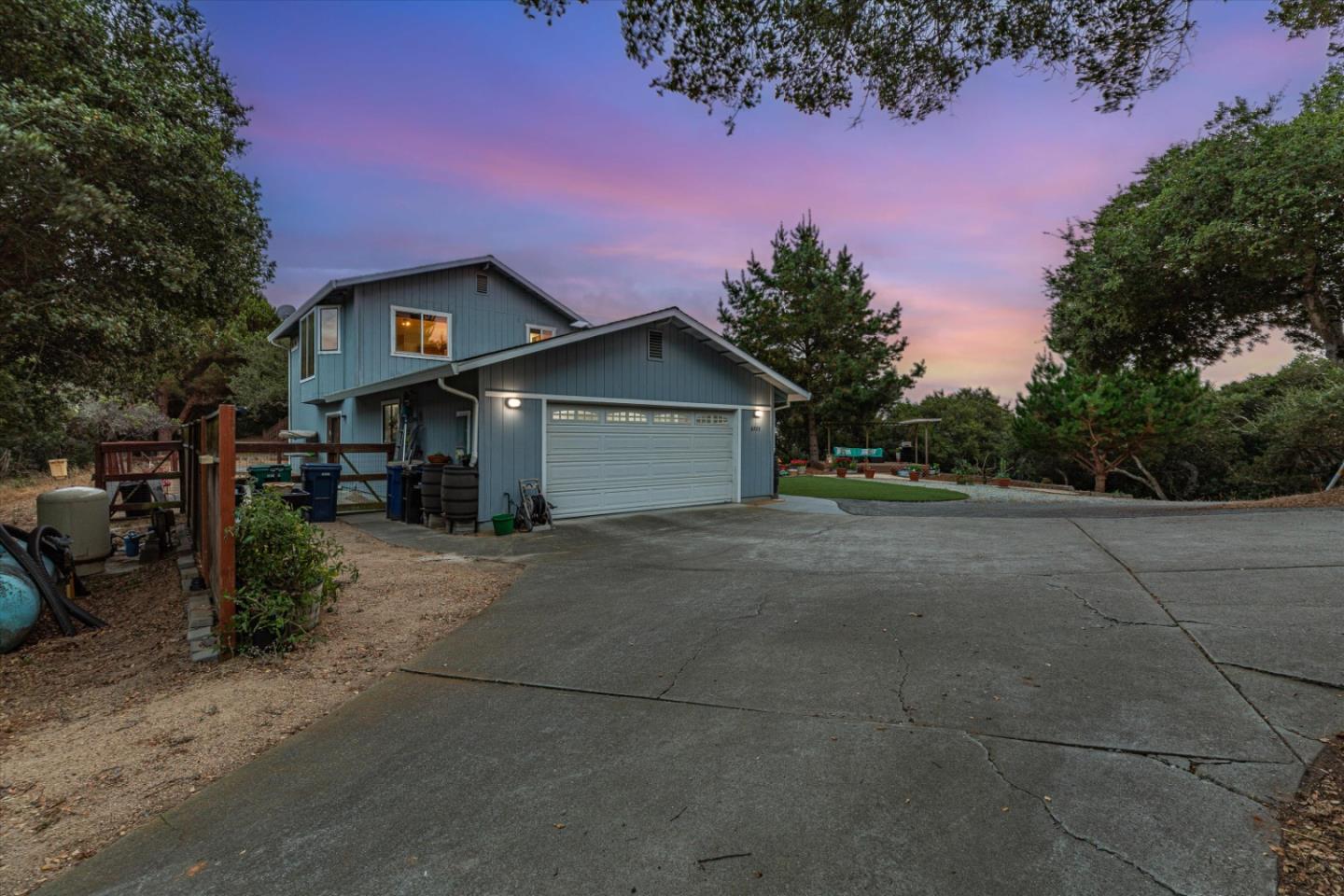 6333 Tustin Road Salinas, CA 93907 - Photo 71 of 88 a front view of a house with a yard and garage