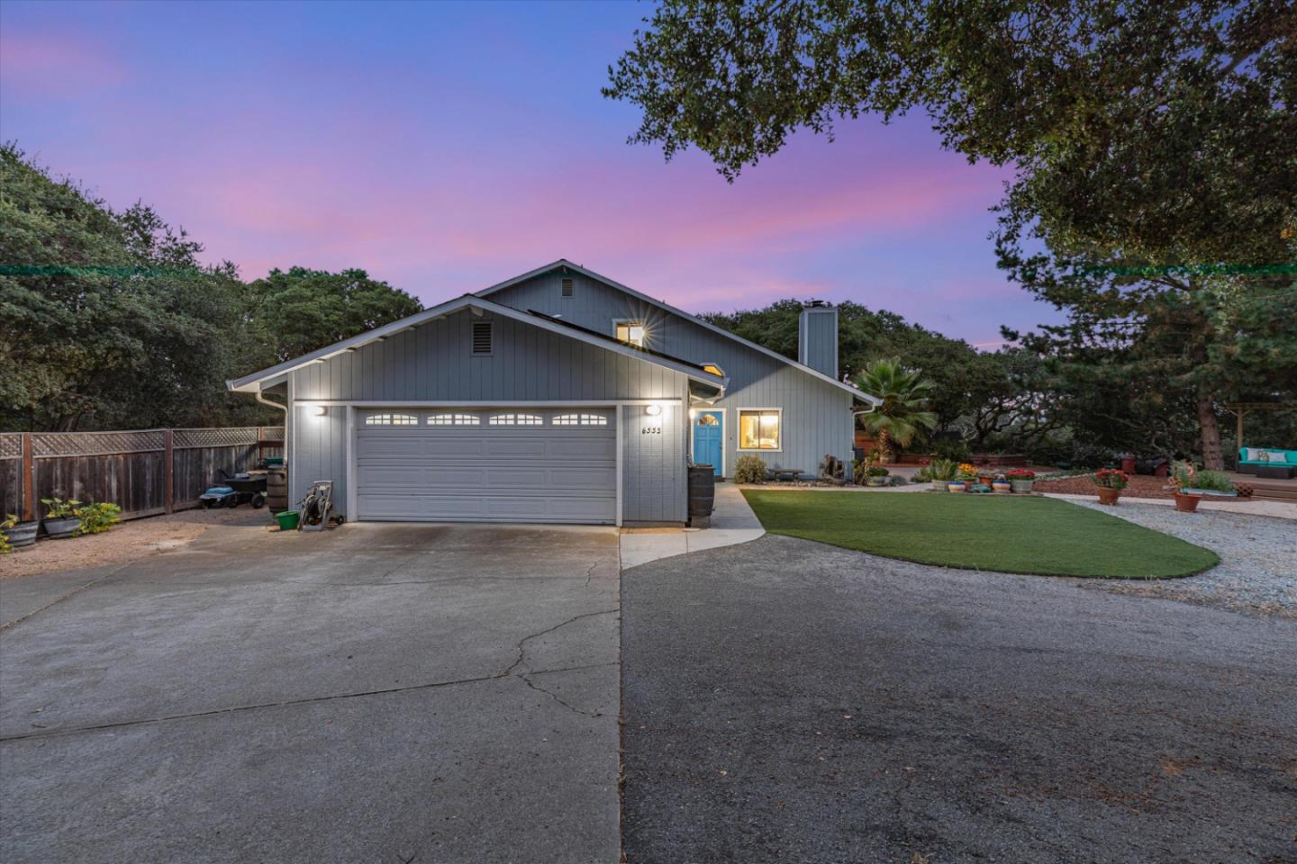 6333 Tustin Road Salinas, CA 93907 - Photo 78 of 88 a front view of a house with a yard and garage