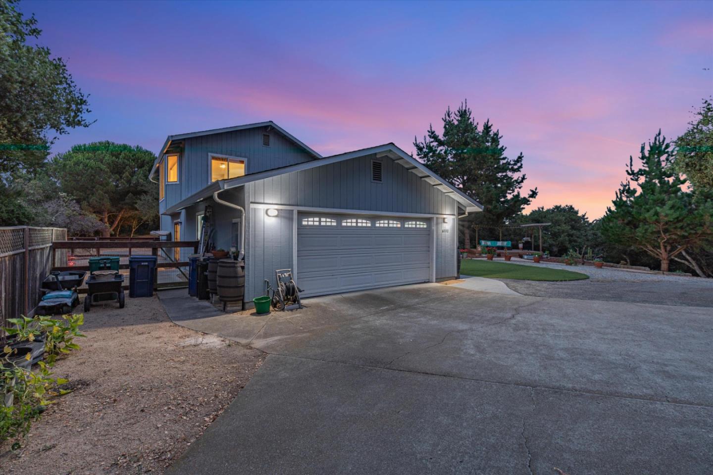 6333 Tustin Road Salinas, CA 93907 - Photo 80 of 88 a view of a house with a garage and a yard